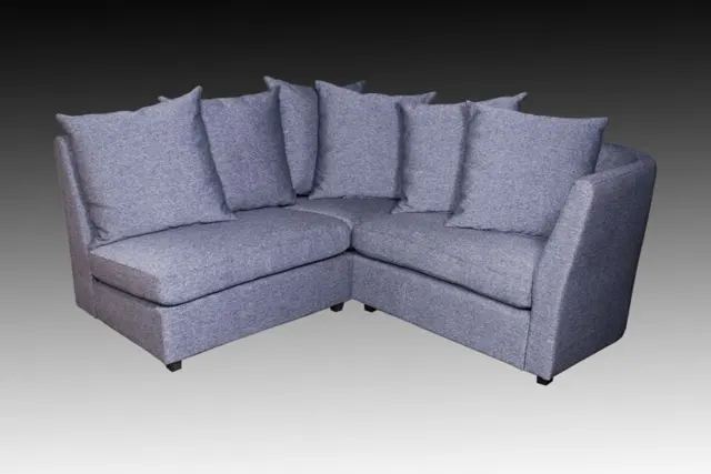 Pilka kampinė sofa